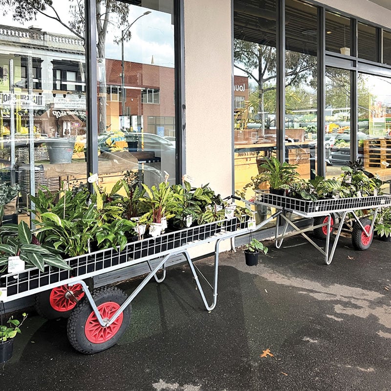 Plant display trolley fitted with plastic centred pneumatic wheels&mdash;suitable for wet environments